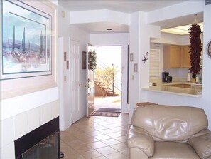 Front door from living room, open kitchen