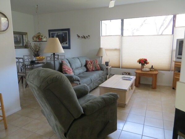 Living room with new couch and recliner 