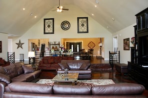 High ceiling make the living room feel large & spacious!
