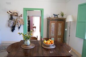 Dining room and kitchen, access to the leaving room in the background