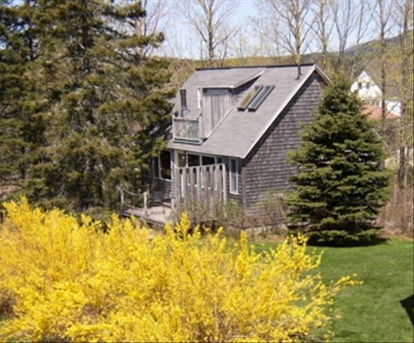 The Carriage House with the Mountains of Acadia in the Background