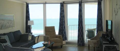 Floor to Ceiling windows across the living room