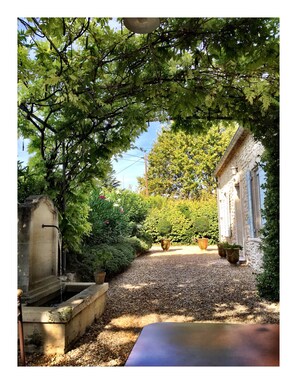 Dining in the shade by the fountain is delightful