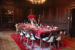 Oak-panelled dining room at Christmas