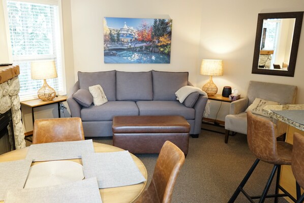 Cozy living and dining room to relax and watch TV or eat dinner.