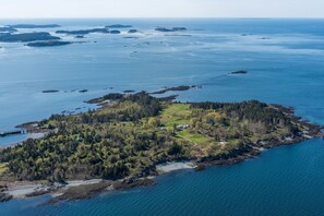 Looking south, house/guest house in center, dock on left 