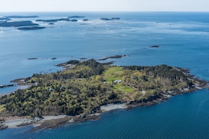 Looking south, house/guest house in center, dock on left 