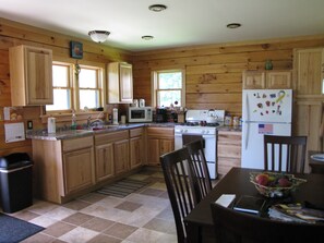 Full kitchen w/ dining area and the convenience of a home cooked meal.