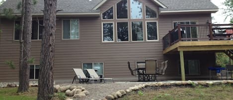 Back of house. Lots of windows with lake views.