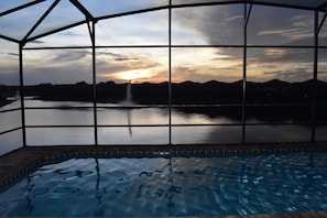 You can watch the sun sets from our south-facing pool that overlooks the lake.