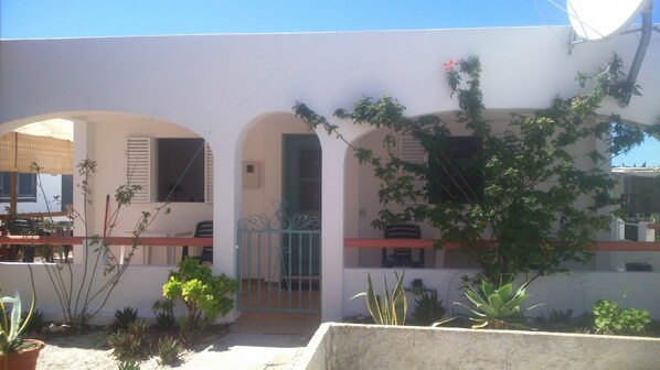 Front of house with covered terrace