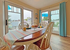 Dining room at Blue Hydrangea Cottage in Belmar.