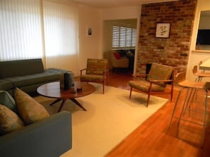 Living Room with Over-Sized Couch and Fireplace