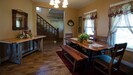 The dining room is right inside the main entrance and next to the kitchen