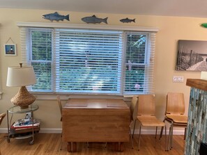 The dining area with the gateleg table folded.