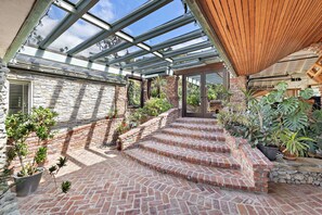 Atrium entry brings indoor/outdoor feel and tons of natural light.