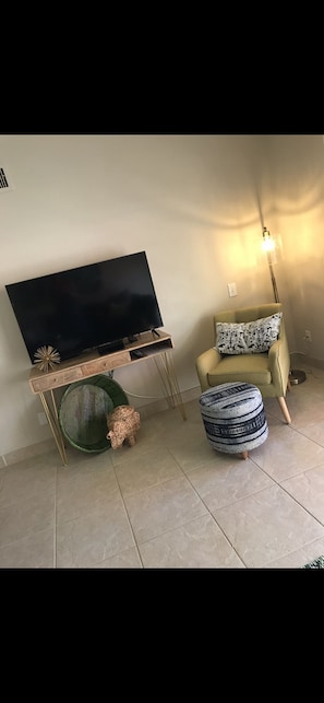 Cable flat screen smart tv in living area