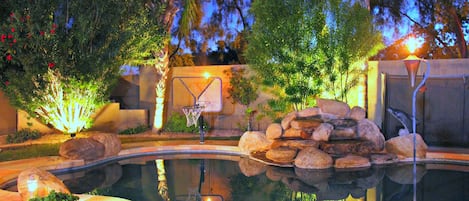 Relax in your private,  fenced in heated pool with a waterfall!