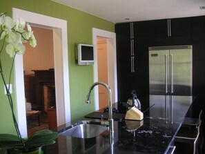 Gourmet kitchen is equipped for either a quick snack or to create a special meal