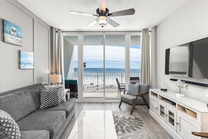 Living room, flat screen TV, balcony views