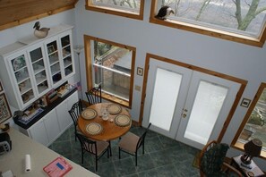 Dining area from loft. Dine, play cards , do puzzles or write your next Novel!