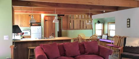 Living Room with kitchen behind it.  The loft bedroom is just above it.