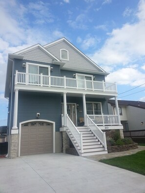 Driveway and side of house, parking for up to 3 cars