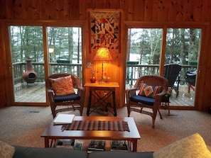 View of living room to Plum Lake