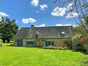 Rear of cottage with a large private garden.
