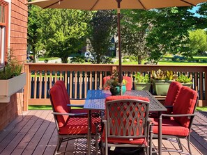 Large deck overlooking Conrad Mansion grounds
