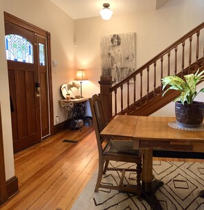 front entry foyer with a dining table on occasion 