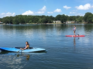 Paddling with duck near our dock