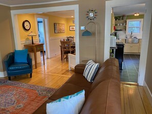 View of three rooms from entrance area.