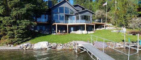 Home from the dock showing lawn, access to dock,
large lakeside decks