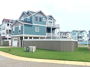 Large, side courtyard with fence