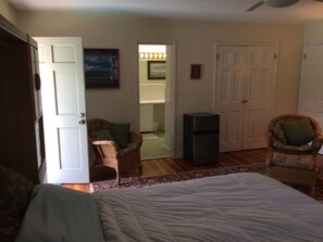 BEDROOM - WITH ENTRY DOOR OPEN TO THE POOL