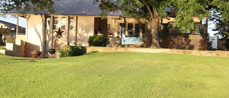 Back of home: Lower patio, Upper patio, covered deck, Lush lawn, GREAT VIEWS