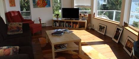 Living Room with a great view of the coastal mountans & ocean and ferries