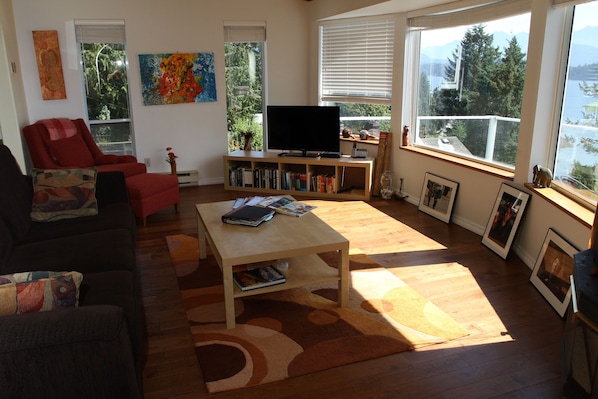 Living Room with a great view of the coastal mountans & ocean and ferries