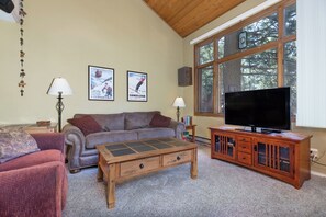 Living room with couch, loveseat, and easychair