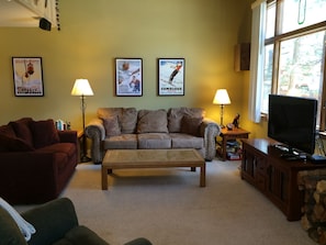 Living room with couch, loveseat, and easychair