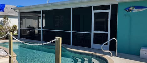 Heated pool and screened lanai. 