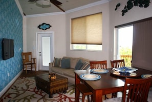 'Sunset' Living room with smart tv and stenciled wall