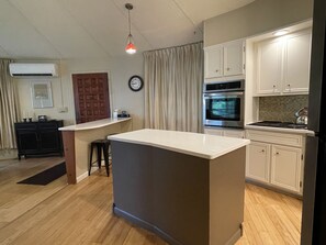 View of entry area and kitchen