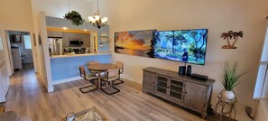 Beautifully decorated condo with dining area, entertainment and kitchen
