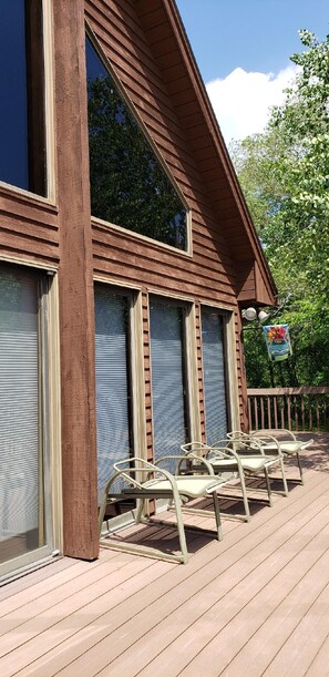 Wrap around deck with lounge chairs.  Shaded and sunny spots.