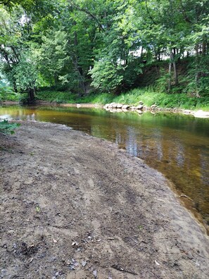 Beach and swimming area at the corner of the field 