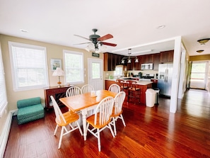 Open concept kitchen, dining and living area. Bright and beautiful!