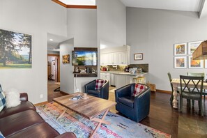 Living room, looking into the kitchen and dining area