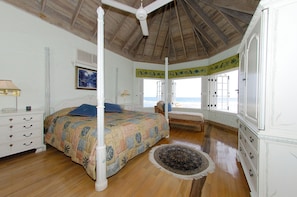 The spacious Master bedroom with comes equipped with King bed, air conditioning, flat screen TV, dvd, full private bath and probably the view Errol Flynn was enjoying when he described Port Antonio as 'more beautiful than any woman he'd ever seen'.